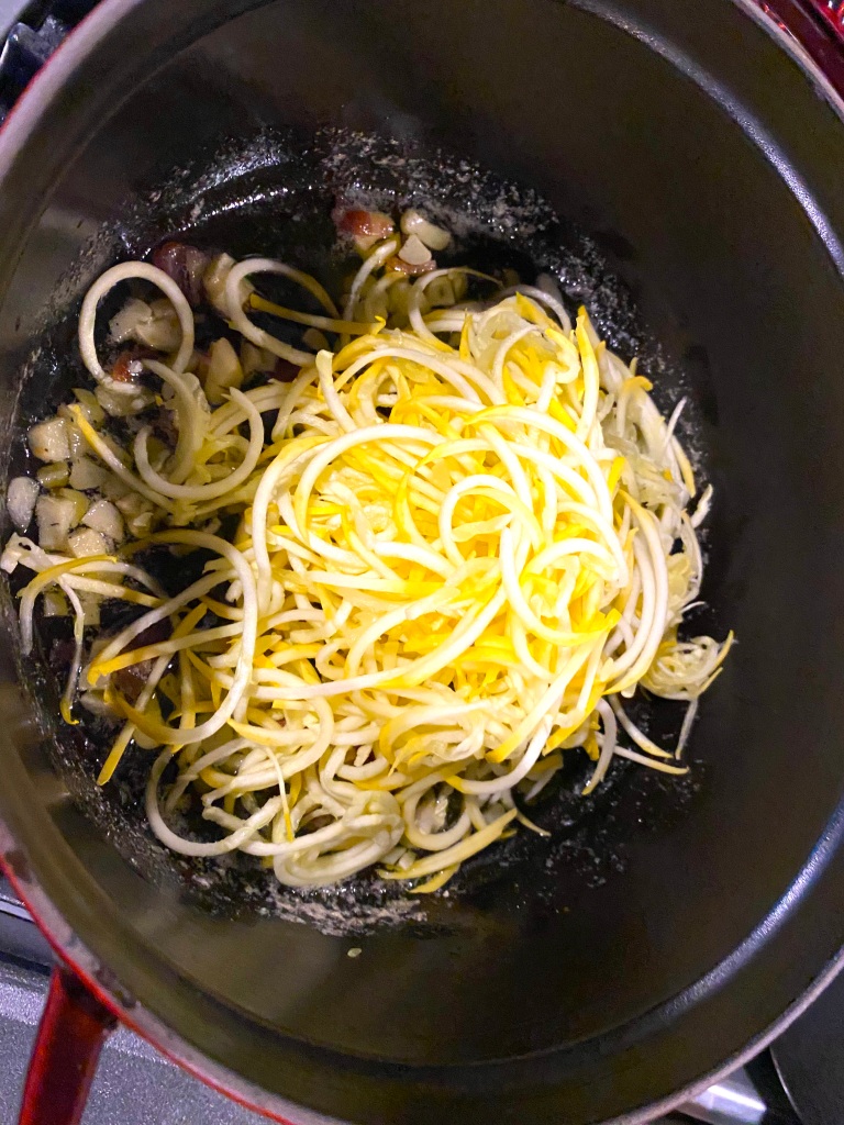 This image has an empty alt attribute; its file name is cooking-zoodle-noodles-in-a-pan.jpeg