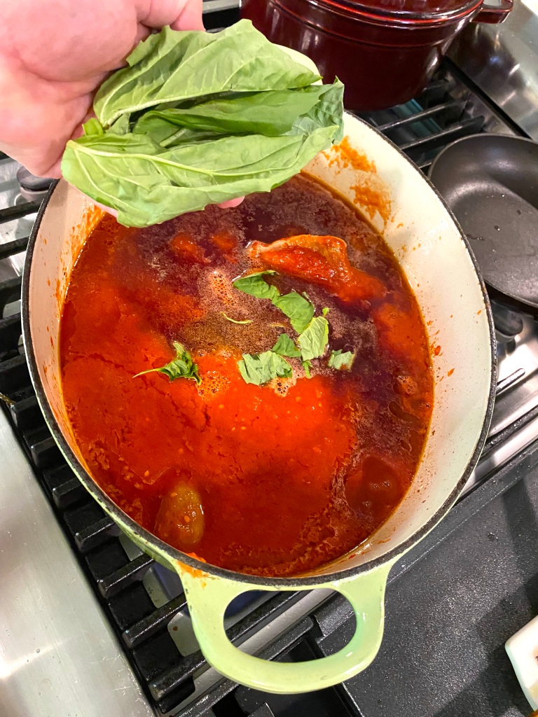 This image has an empty alt attribute; its file name is fresh-basil-for-sunday-gravy-recipe.jpeg